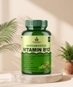 VedSudham plant-based Vitamin B12, 60 vegetarian capsules, on a cream pedestal with green plants